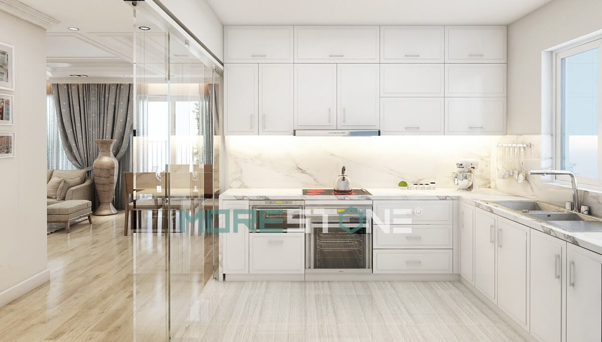 Đá trắng vân mây tạo cho căn bếp không gian sạch sẽ, hài hòa với thiết kế của tủ bếp Thiết kế và sản xuất tủ bếp đẹp
